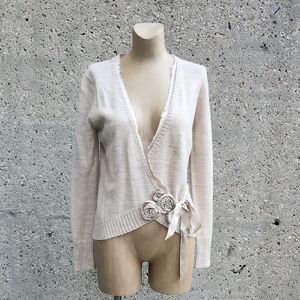 Nougat London Cream V-Neck Sweater with Floral Accent